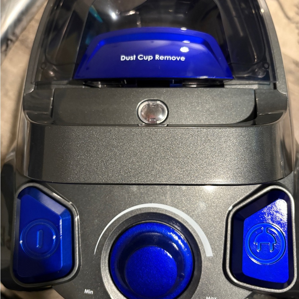 Blue and Gray Vacuum Cleaner